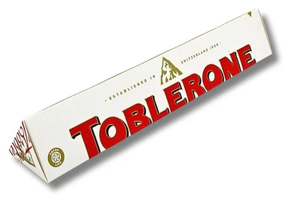 Шоколад білий Toblerone White Chocolane Almond Nougat з медово-мигдальною нугою 100 г