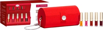 Набір олійок для губ Clarins Lip Comfort Oil 01 Honey 1.4 мл + 04 Pitaya 1.4 мл + 08 Strawberry 1.4 мл + 03 Cherry 1.4 мл + 09 Chocolate 1.4 мл + сумочка (3666057341113)