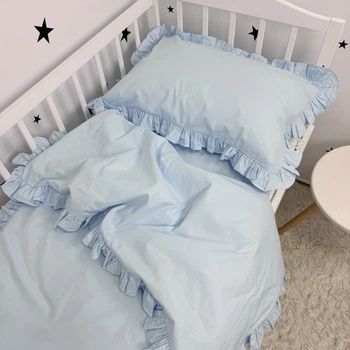 Натуральна постільна білизна з рюшами однотонна для ліжка 160х80 см з підковдрою 140х110 см Oh My Kids «Light Blue» ранфорс