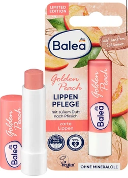 Бальзам для губ з маслом ши та ароматом персика Balea Lippenpflege Golden Peach 4,8 г
