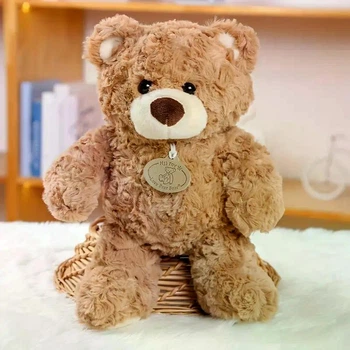 М`яка іграшка Ведмедик коричневий з медальйоном 30 см