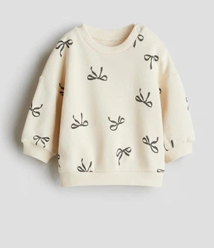 Кофта для дівчинки H&M Молочна з бантиками 98 см