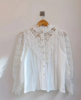 Блузка мереживна з коміром стійкою й ажурними рукавами ошатна стильна GOLDENBLOUSE біла L
