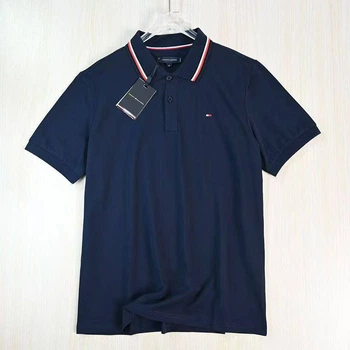 Футболка поло Tommy Hilfiger синього кольору розмір L