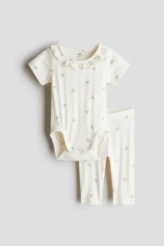 Штани H&M 1281195 56см молочний квіти