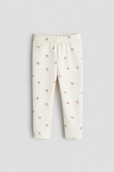Штани H&M 1255880 56см світло-бежевий квіти