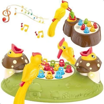 Музыкальная игра Y 33926 A (32) "Накорми птичку", на батарейках, веселая песенка, подсветка, автоматическое движение, черви, 2 птички, в коробке