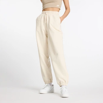 Женские бежевые спортивные брюки New Balance NB Athletics 40 (L) (WP41513LIN)