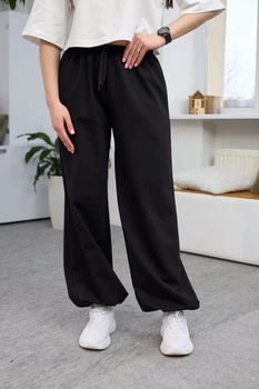 Женские молодежные широкие брюки оверсайз из трикотажа на шнурке с карманами Aksan 26.2914 40 (XS) Черный