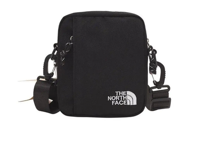 Сумка через плечо The North Face в черном цвете.