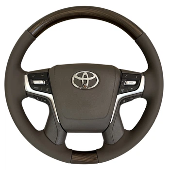 Руль серого цвета для Toyota Land Cruiser 100, Prado 120. В стиле LC150/LC200. Коричневое дерево. Логотип - хром. В сборе.