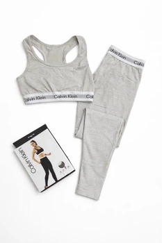Жіночий спортивний комплект для тренувань Calvin Klein спортивного бюстгальтера та легінсів, сірого кольору, ромір M