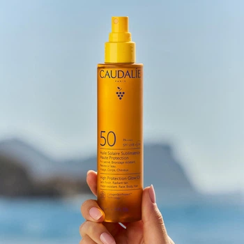 Сонцезахисна Олія-сяяння SPF50 Caudalie 150мл