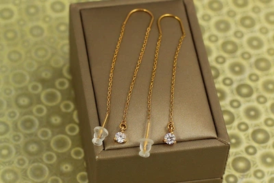 Сережки протяжки Xuping Jewelry з каменем 4 мм золотисті