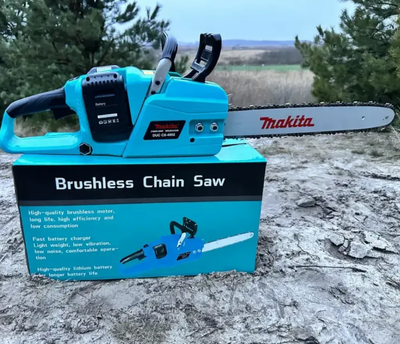 Аккумуляторная цепная пила Makita DUC CS-4002 с шиной 40 см и 2 аккумуляторами 48 В 6 Ач