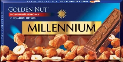 Шоколад Millennium молочний з цілими лісовими горіхами 100г.
