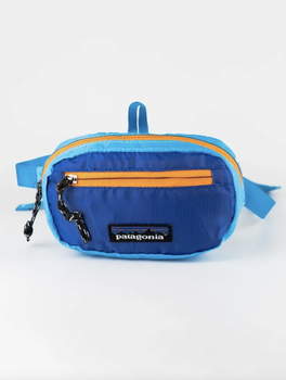 Сумка через плече/на пояс Patagonia Ultralight Hole Mini Hip Pack у бірюзово-синьому кольорі.