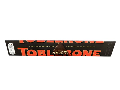 Чорний шоколад Toblerone Dark з медово-мигдальною нугою 100 г (7614500010617)