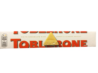 Білий шоколад Toblerone з медово-мигдальною нугою 100 г (7614500010310)