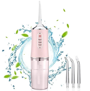 Іригатор для чищення зубів та порожнини рота Oral Irrigator з акумулятором та змінними насадками Pink
