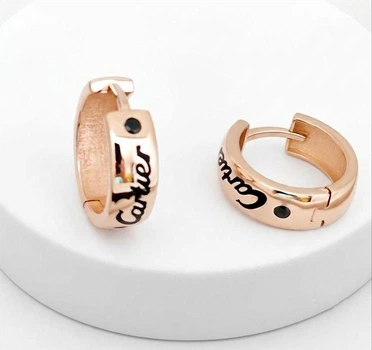 Золоті сережки-конго «Роял» в стилі Cartier.