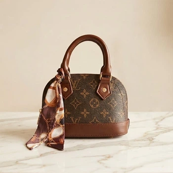 Брендова жіноча сумка Louis Vuitton Alma Nano Mini Monogram коричнева з ручками