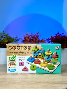 Дерев'яний геометричний сортер 68446 (36) "WToys", сортер за кольорами, гра з кілочками, в коробці