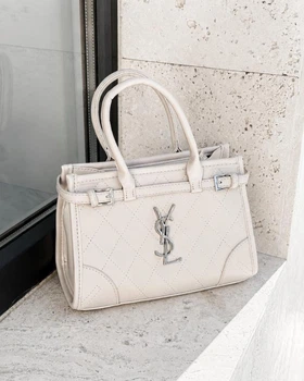Элегантная женская кожаная сумка Saint Laurent молочная (96734)