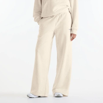 Женские бежевые спортивные брюки New Balance Trackside French Terry 38 (M) (WB62412FLIT)