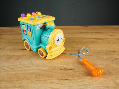 Музичний паровозик 95606 "WToys", 2 кольори, ОЗВУЧУВАННЯ УКРАЇНСЬКОЮ МОВОЮ, казки, пісні, скоромовки, загадки, світло, пальчикові