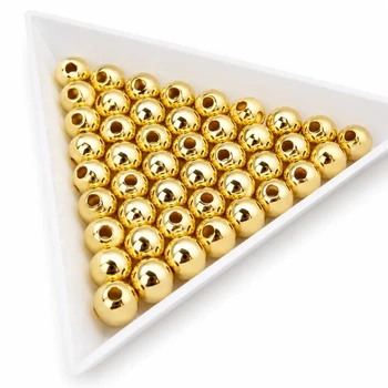 Намистини пластикові золотисті 6 мм 500 г (Gold-500/6)