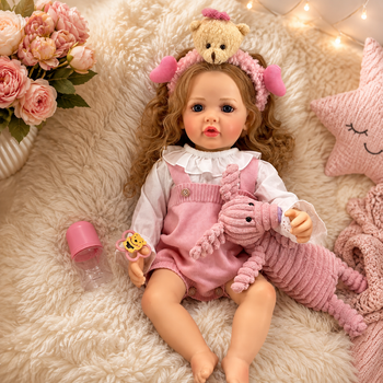 Реалістична лялька реборн Reborn Baby Doll Liana 55 см – дівчинка з кучерявим світлим волоссям та аксесуарами, можна купати (RB099)