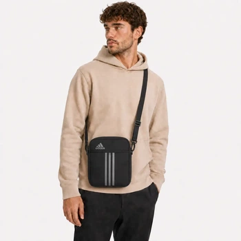 Сумка через плечо Adidas черно-серого цвета.