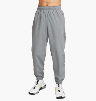 Брюки чоловічі Nike Form Mens Dri-Fit Tapered Versatile Pants Grey L Сірий FB7497-084