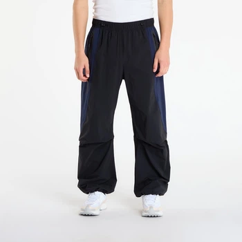 Брюки мужские Nike Тech Dri-Fit Woven Color-Block Oversized Pants L Чорний IH8466-010