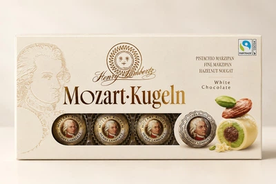 Цукерки в білому шоколаді Mozart Kugeln Henry Lambertz 200 гр марципан