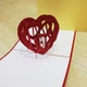 3D открытка Shishi "Пара влюбленных в сердце" 15,5 х 15,5 см красная - изображение 3