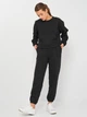 Спортивный костюм женский Puma Loungewear Suit 84585501 S Puma Black (4063699229097) - изображение 1