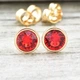 Сережки Xuping з кристалами Swarovski 83084 розмір 6х6 мм колір червоний позолота 18К - зображення 1