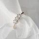Серебряное кольцо с золотыми вставками Трио 17 р - изображение 1