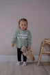 Світшот LaoMe дитячий утеплений з написом Small hands Big hugs 92см фісташковий - изображение 3