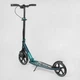 Дитячий двоколісний самокат Best Scooter 43685 зі складною конструкцією, переднім амортизатором і фарою, Бірюзовий - зображення 7