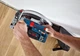 Акумуляторная погружна пила Bosch Professional GKT 18V-52 GC + 2 акб 5 Ah + L-Boxx 238 + диск 140 мм (06016B4000+1600A00B8J) - зображення 6