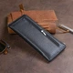 Горизонтальный тонкий кошелек из кожи унисекс ST Leather 19324 Черный - изображение 7