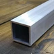 Труба квадратная алюминиевая 10х10х1 без покрытия, деталь 0,5 метра - изображение 1
