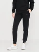Спортивные штаны женские Jack Wolfskin Essential Sweat Pants W 1507092_6000 S Черные (4064993530476) - изображение 1