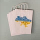 Пакет подарочный с патриотичным рисунком eko-kraft 260*150*350 мм Белый крафт пакет брендированный с ручками "Карта Украины" упаковка 5 шт - изображение 1