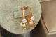 Сережки Xuping Jewelry підковка з фіанітом і перлиною, що танцює, 2.7 см золотисті - зображення 2
