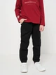 Детские брюки для мальчика Coccodrillo Funny Time Kids ZC2119601FTK-021 116 см Чёрные (5904705999353) - изображение 1