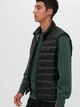 Теплый жилет мужской Uniqlo 402832485 3XL Черный (1159770258) - изображение 1